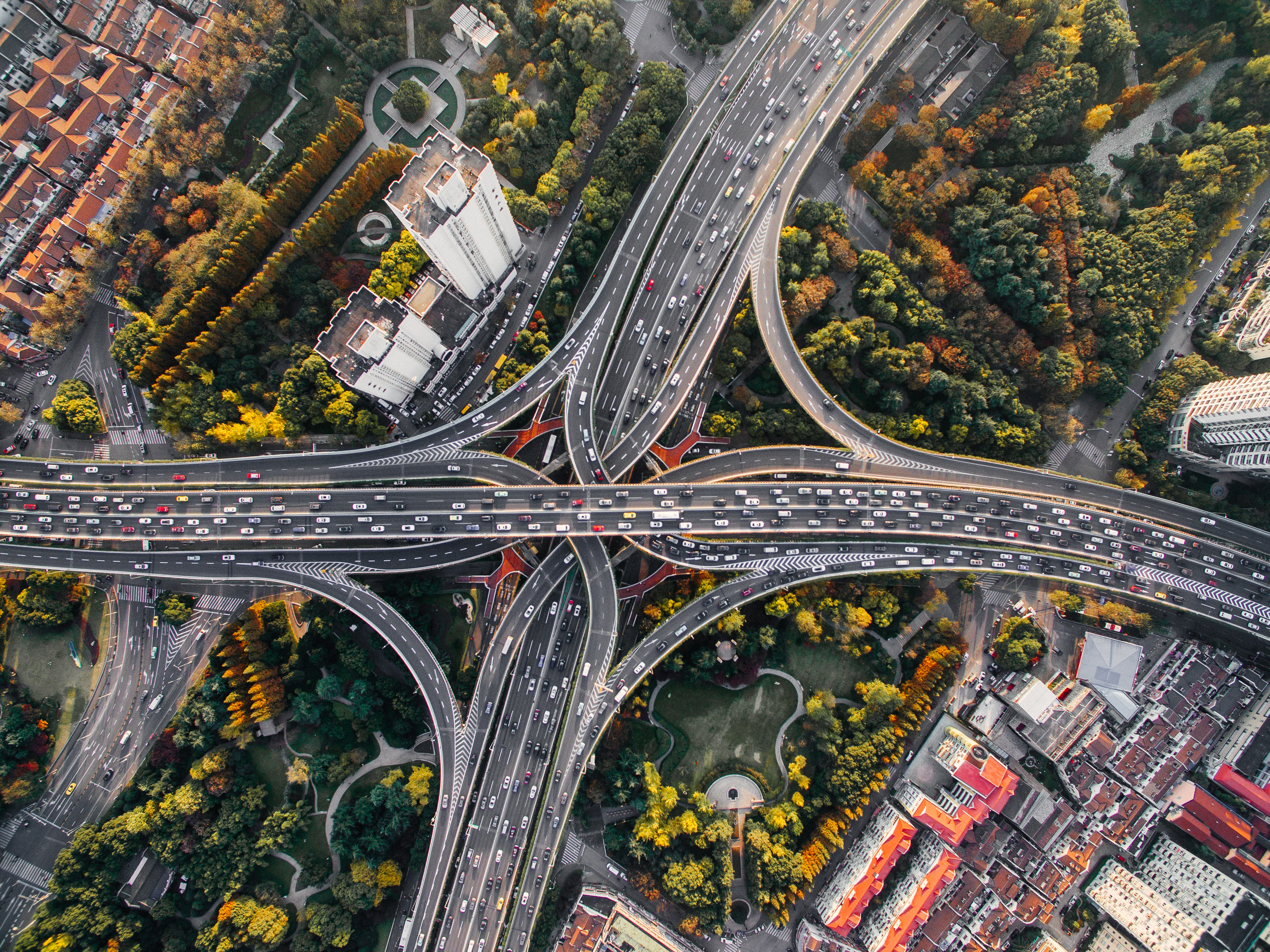 Flying Drones Over Streets and Moving Traffic