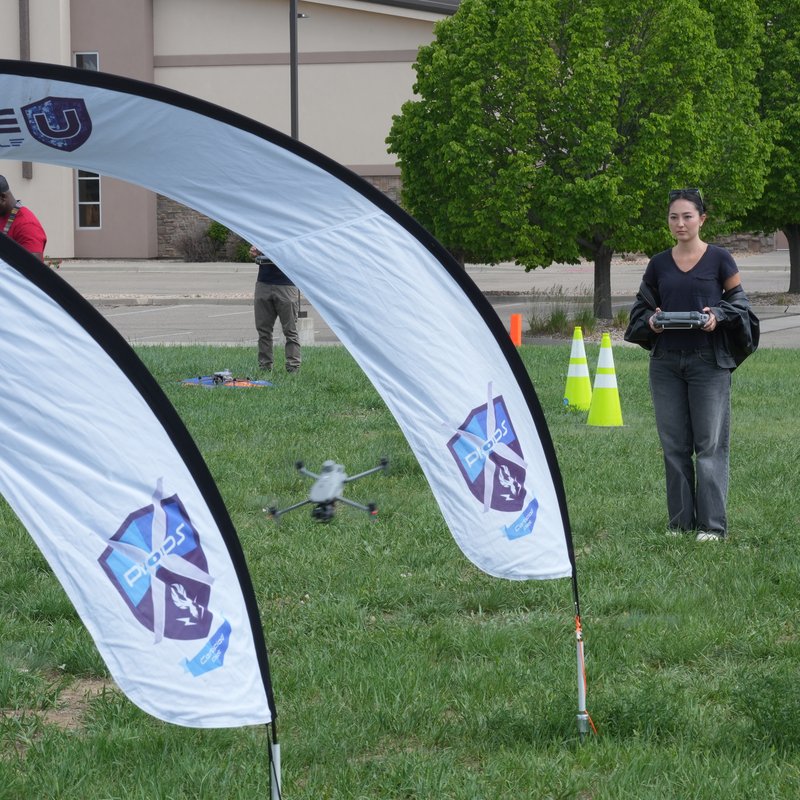Pilot flying a drone through training gates, a fun way to motivate employees to become drone pilots
