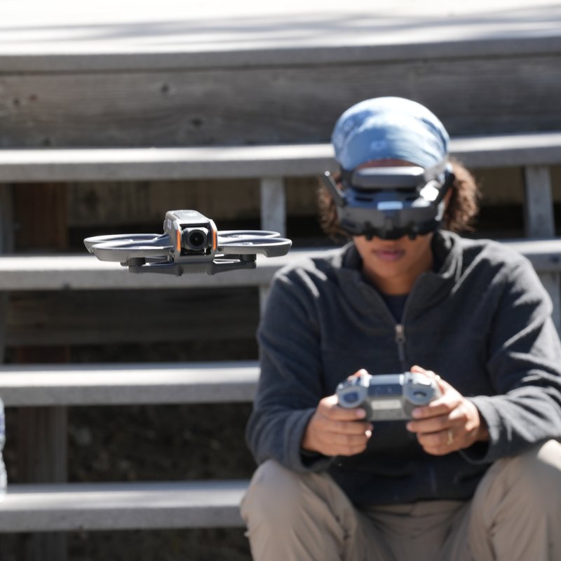 Trainee flying a drone in hands-on training, a safe way to motivate employees to become drone pilots
