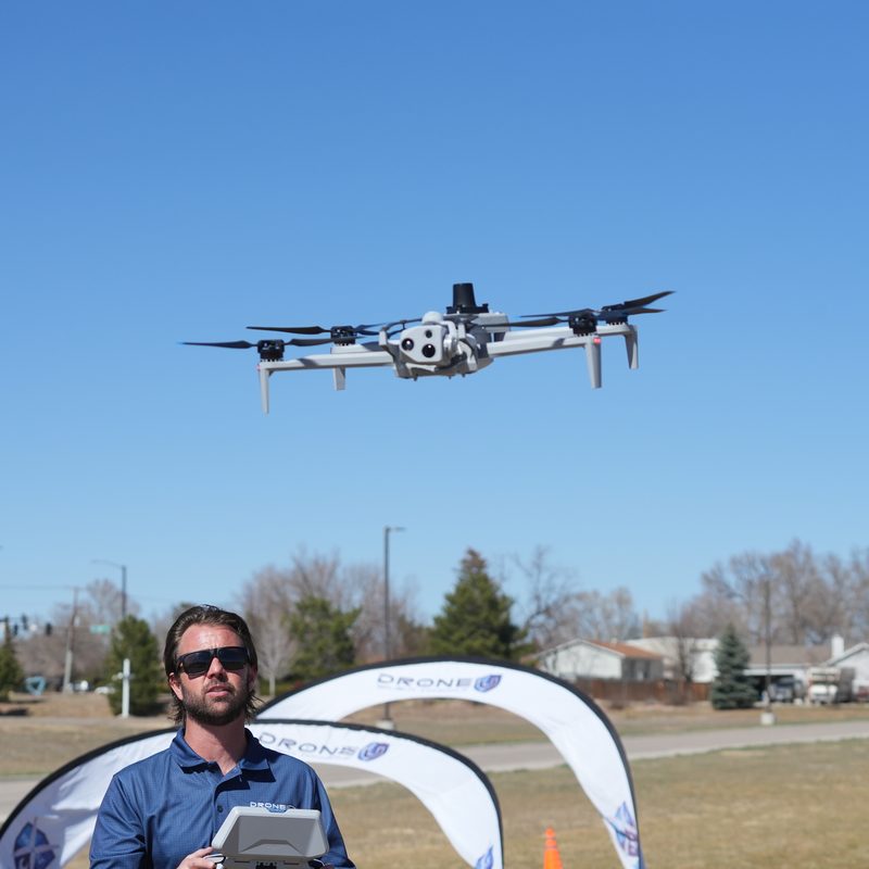 What is a drone - Drone U pilot flying an enterprise drone on a training field